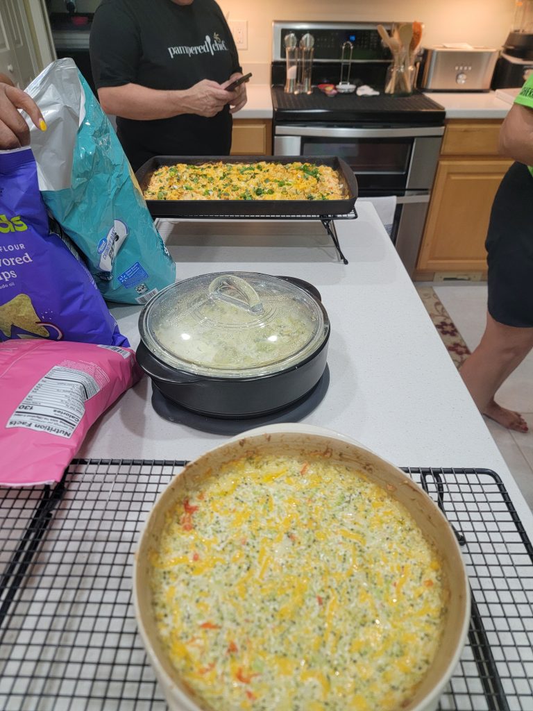 Behind-the-scenes photo of Ian Barnett preparing for a live Pampered Chef cooking demo.